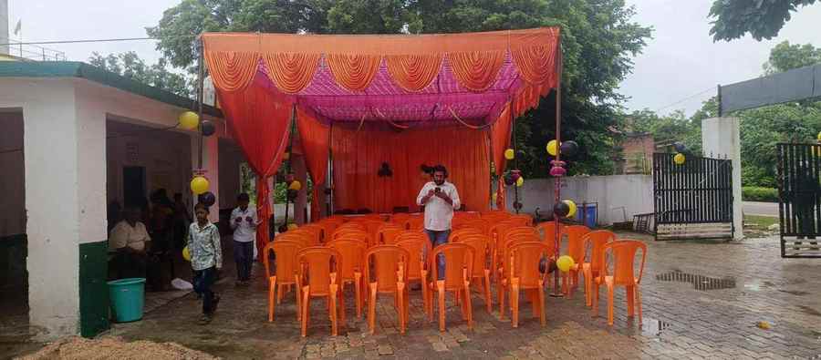 A modest outdoor venue prepared for debate