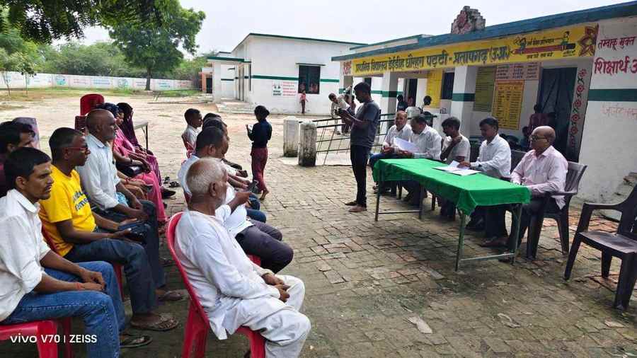 A debate being conducted in a school courtyard